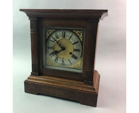 LATE VICTORIAN MANTEL CLOCK, with brass and silvered square dial, contained in an oak case