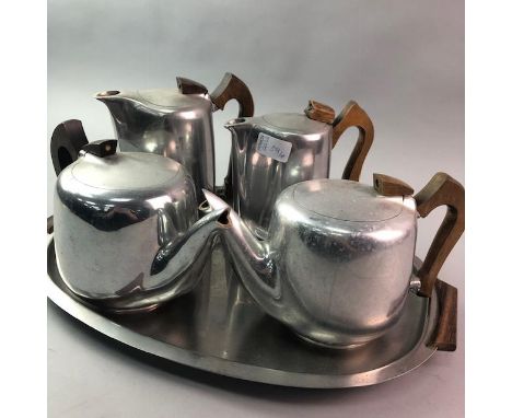 LOT OF PICQUOT WARE TEA POTS, along with water jugs, cream, two Art Deco coffee pots etc
