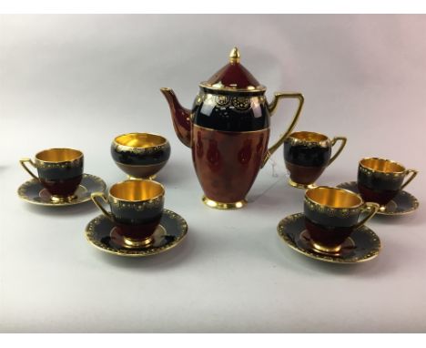 CARLTON WARE COFFEE SERVICE, in red and black with gilt decoration, comprising coffee pot, six cups and saucers, sugar and cr