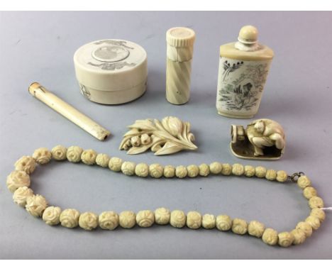 LOT OF CARVED ASIAN ITEMS, including a scent bottle, netsuke brooch, page turner etc
