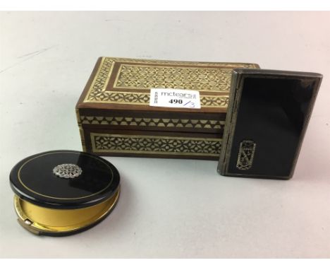 SILVER AND BLACK ENAMEL CIGARETTE CASE, with marcasite decoration, along with a similarly decorated compact and a wooden box 