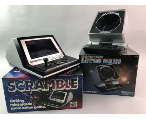 GRANDSTAND SCRAMBLE AND GRANDSTAND ASTRO WARS VINTAGE VIDEO GAMES, boxed