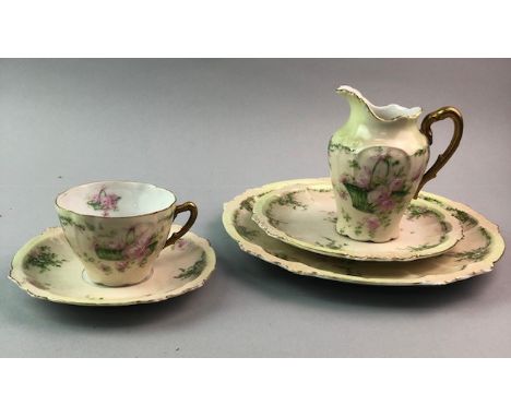 LIMOGE TEA SERVICE, comprising nine teacups, saucers, side plates etc