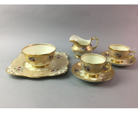 EARLY 20TH CENTURY TUSCAN CHINA TEA SERVICE, with floral and gilt partially-painted decoration, comprising: 7 cups, 10 saucer