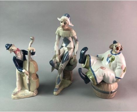 NAO FIGURE OF A GIRL, wearing a wide brimmed hat, along with two Casades figures of a clown and a mime and two further figure