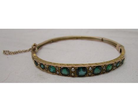 Gold stone set bangle