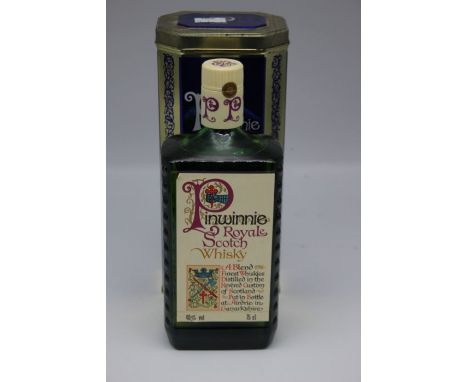 A Bottle Of Pinwinnie Royale Scotch Whisky In Presentation Tin. Tin Is In Good Overall Condition And Bottle Measures Above Th