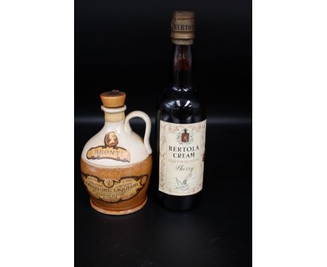 A Ceramic Jug Of Bronte Yorkshire Liqueur And A Bottle Of Bertola Cream Sherry
