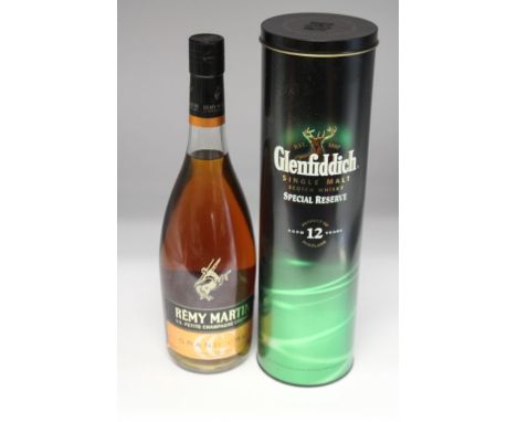 A Bottle Of Glenfiddich 12 Year Single Malt And A Bottle Of Remy Martin V.S Petite Champagne Cognac Grand Cru. Both Bottles A