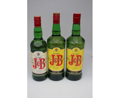 Three Bottles Of J& B Rare Blended Scotch Whisky. All Three Bottles Measure Into The Neck.Two Bottles Are 1 Litre Measurement