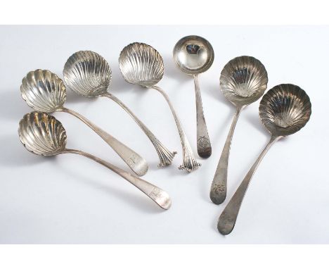 A PAIR OF GEORGE III ONSLOW PATTERN SAUCE LADLES crested, by George Baskerville, London 1761, a pair of Old English pattern s