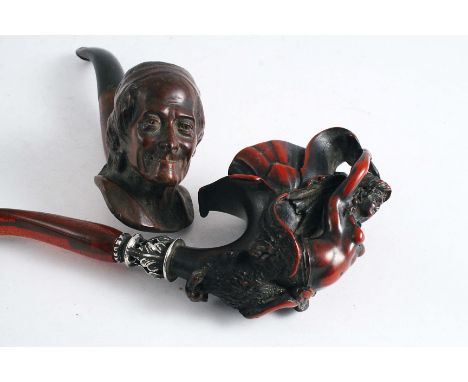 TWO PIPES an example of Art Nouveau design, the bowl carved with a girl emerging from a flower, silver coloured metal mount, 