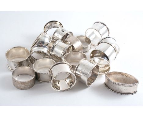 NAPKIN RINGS; A pair of Victorian engine turned examples, a pair of plain examples, initialled, a pair of plain examples with