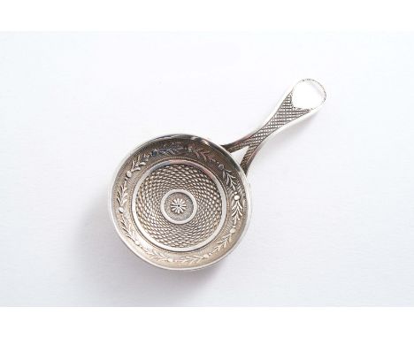 A GEORGE III CADDY SPOON  resembling a frying pan with stamped decoration & a bifurcated handle, by Matthew Linwood, Birmingh