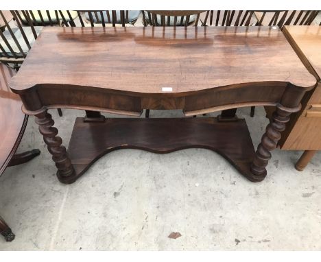 A MAHOGANY SIDE TABLE ON BARLEY TWIST SUPPORTS WITH LOWER SHELF AND SINGLE DRAWER 