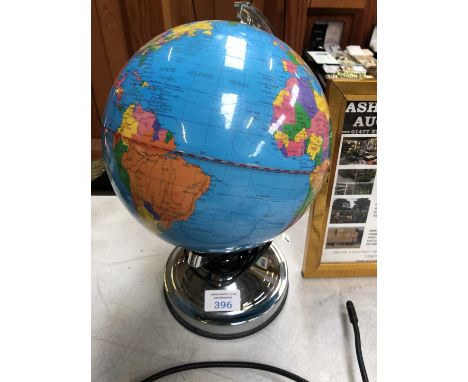 A TOUCH LIGHT UP GLOBE 