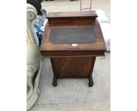 AN INLAID MAHOGANY DAVENPORT WITH HINGED TOP, PEN AND INKWELL COMPARTMENT AND FOUR SIDE DRAWERS 