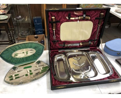 A 'CAVALIER' CASED STAINLESS STEEL SERVING SET AND A LADIES DRESSING TABLE JADE STYLE MANICURE SET (2) 