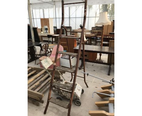 A FIVE RUNG WOOD AND METAL STEP LADDER AND A VINTAGE WHITE LINE PAINTER 