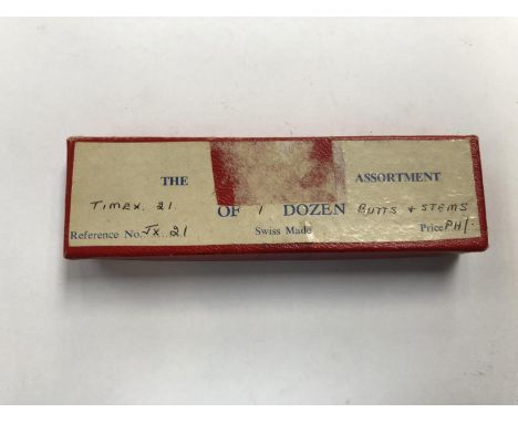 A BOX OF ASSORTED TIMEX WATCH WINDER PARTS 