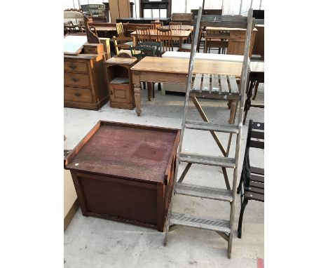 A FOUR RUNG WOODEN STEP LADDER AND A WOODEN STORAGE BOX 70CM X 56CM X 57CM 