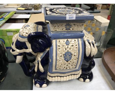 A LARGE DECORATIVE CERAMIC ELEPHANT GARDEN SEAT 