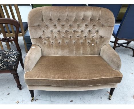 A PARKER KNOLL BUTTON BACK TWO SEATER SOFA 