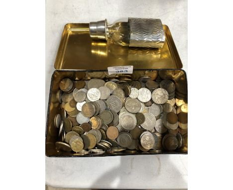 A TIN OF ASSORTED FOREIGN COINS AND A HIP FLASK 