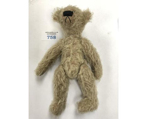 A VINTAGE SOFT TOY 'HOO BEAR' DESIGNED BY HELEN OLIVER 