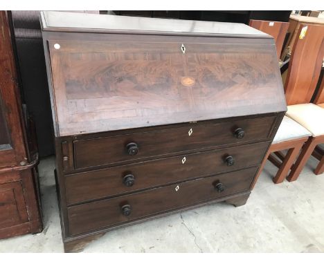 A LARGE INLAID MAHOGANY BUREAU ON BRACKET FEET WITH FALL FRONT AND THREE DRAWERS HAVING BONE ESCUTCHEONS 