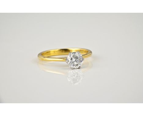 An 18ct yellow gold and diamond single stone ring, with a 1.00ct brilliant cut diamond, ring size N.