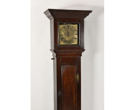 A mid-18th century oak longcase 30 hour clock by John Nethercott of Long Compton, Warwickshire, the square, 9in. brass dial s