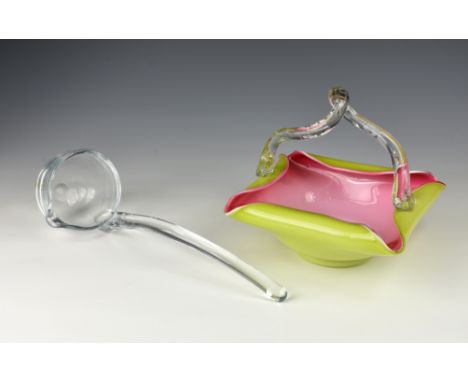 A Victorian glass fruit basket, of square form with folded edges, lime green with pink interior, clear glass twist handle, 7¾