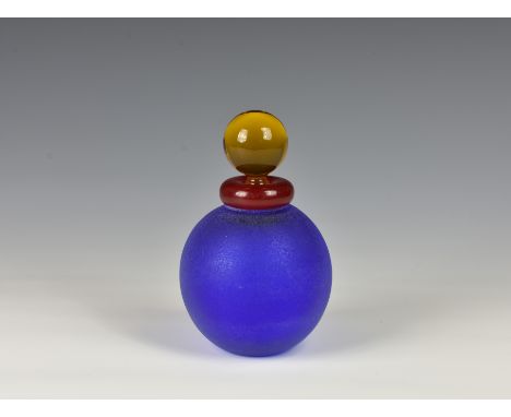 A Murano glass scent bottle by Franco Moretti, blue frosted glass spherical bottle with ruby red collar and amber glass ball 