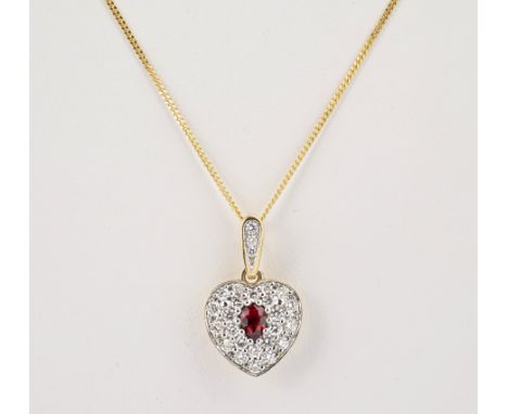 An 18ct yellow gold, ruby and diamond heart shaped pendant, the heart with central oval cut ruby within pavé set brilliant cu