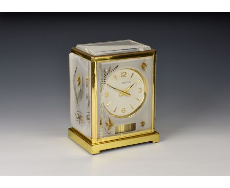 A Jaeger-le-Coultre Atmos Aquarium clock, the gilt brass case glazed with opaque perspex panels containing gilt angel fish, s