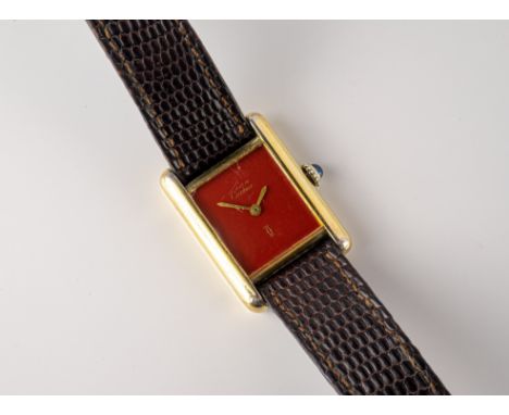 A ladies silver gilt Must de Cartier Tank wrist watch, c.1980, the two piece screw down case with sapphire crown, no. 3 08590