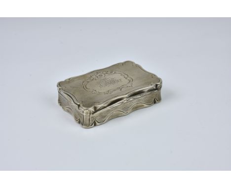 A Victorian silver snuff box, Roberts & Briggs, Sheffield, 1865, of shaped rectangular form, the hinged lid with central flor