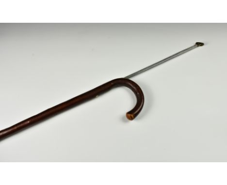 An Edwardian horse measuring gadget walking stick/cane, Swaine & Adeney Ltd, London, made from birch, metal mounts, the pull 