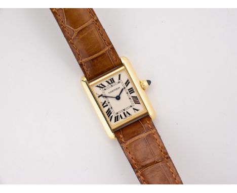 A ladies Cartier 18ct yellow gold Tank Louis wristwatch, ref. 2442, no. W1529856, c.2011, silvered dial with gloss black Roma