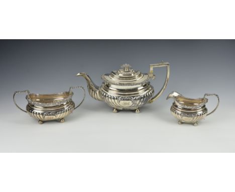 A good George IV silver three piece tea service, William Bateman I, London, 1823, comprising a teapot, milk jug and sugar bow