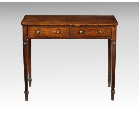 A late Regency mahogany two drawer side table, the rectangular, ebony edge strung top with rounded front angles, over two fri