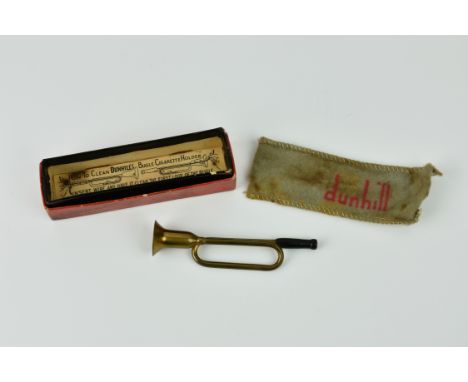 A rare vintage novelty Dunhill Bugle cigarette holder, realistic bugle shaped holder in brass with early plastic mouth piece,