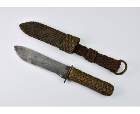 A seaman's knife with lattice work handle and scabbard., 