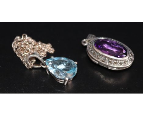 Silver And Marcasite Blue Stone Pendant On Chain Together With A Silver And Purple Stone Locket, 13.9 Grams Weight 