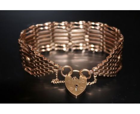 9ct Gold Gate Bracelet with Attached 9ct Gold Heart Shaped Padlock and Safety Chain. Fully Hallmarked and In Excellent Condit