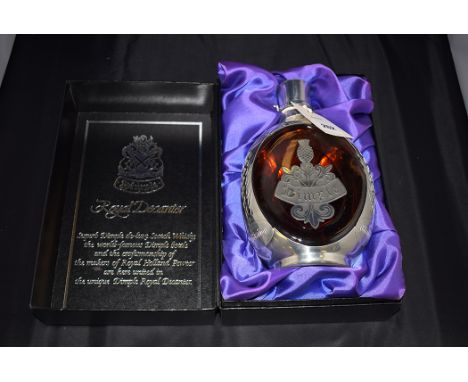A Haig 'Dimple' decanter containing Scotch Whisky, No. 57386, boxed.