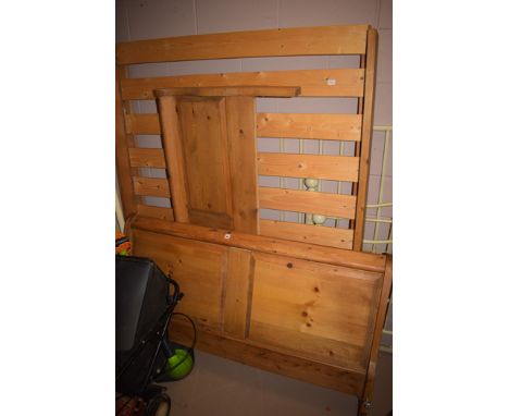 A modern pine double bed.