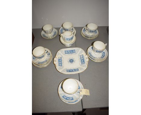 A Coalport 'Revelry' pattern tea for six, comprising: tea cups, saucers, tea plates, cream jug, sugar bowl and sandwich plate