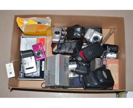 A collection of modern pocket cameras by Canon, Kodak, Nikon, Olympus, Ricoh and others; and camera sundries in a box.
